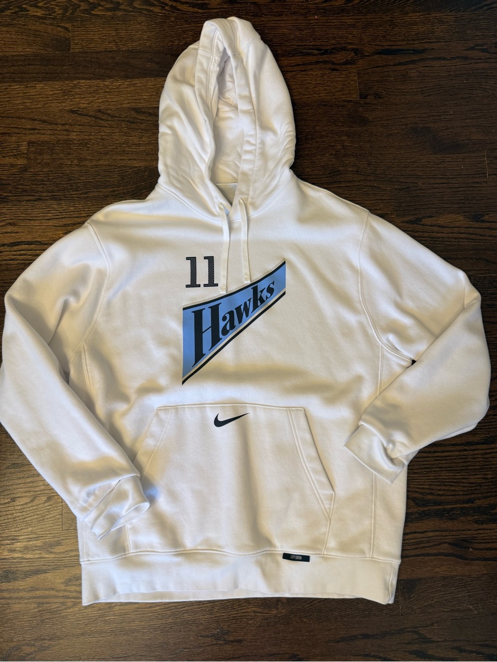 Nike White Trae Young Atlanta Hawks Hoodie with Light Blue Hawks Graphic